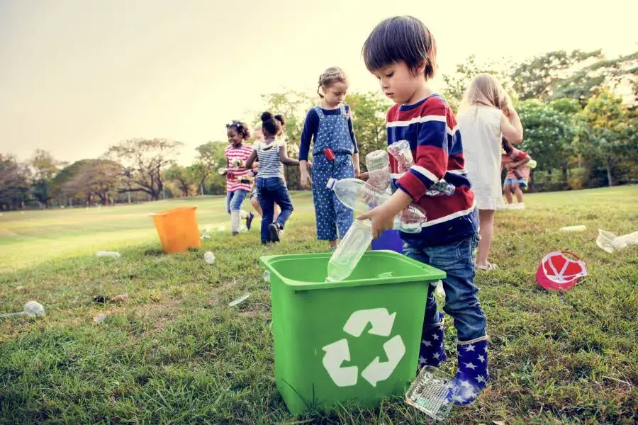 children recycling plastic
